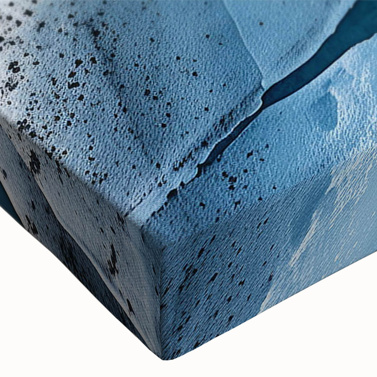 Close-up of a stretched canvas wall art piece showcasing a stunning glacier landscape design, featuring vibrant blues and whites, perfect for modern home decor.