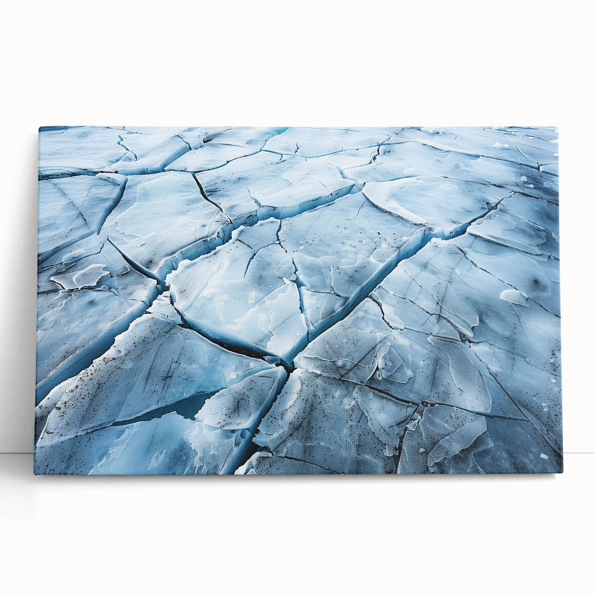 Stretched canvas wall art showcasing a serene glacier landscape design with cool blue and white tones, ideal for adding a tranquil touch to home decor.