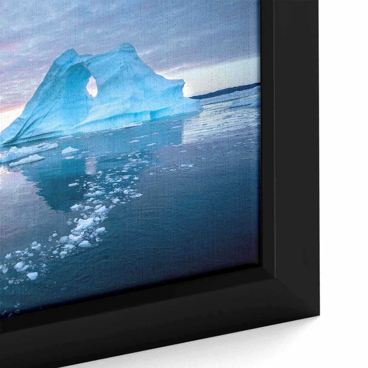 Close-up of a framed canvas wall art piece showcasing a stunning glacier landscape design, featuring icy blues and whites, perfect for modern home decor.