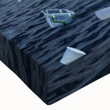 Close-up of a stretched canvas featuring a vibrant glacier landscape design with shades of blue and white, perfect for modern home decor and art enthusiasts.