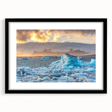 Framed wall art featuring a stunning glacier landscape design, presented in a sleek black frame with a white mat, perfect for enhancing modern home decor.