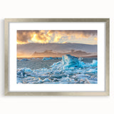Framed wall art collection showcasing a stunning glacier landscape design with a silver mat, perfect for enhancing modern home decor. The elegant frame complements the vivid colors and intricate details of the artwork, making it an eye-catching focal point for any room.