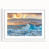 Framed wall art featuring a stunning glacier landscape design, showcasing vibrant blues and whites, with a white mat and sleek frame, perfect for home decor.