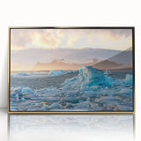 Framed wall art featuring a stunning glacier landscape design, showcasing vibrant blue and white hues, with a sleek gold frame for a modern touch. Perfect for enhancing any interior decor.