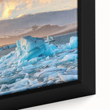 Close-up of a framed canvas artwork showcasing a stunning glacier landscape design, featuring vibrant blues and whites, perfect for modern home decor and nature enthusiasts.