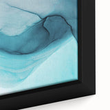 Close-up of a framed canvas wall art piece showcasing a stunning glacier landscape design, featuring vibrant blues and whites that evoke a sense of tranquility. Ideal for modern home decor, this artwork captures the beauty of nature, making it a perfect addition to any room.
