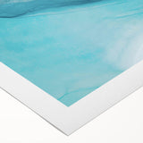 Vibrant rolled canvas artwork showcasing a stunning glacier landscape design, featuring rich blues and whites, perfect for modern home decor and wall art enthusiasts.