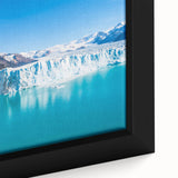 Framed canvas wall art showcasing a stunning close-up of a glacier landscape design, featuring vibrant blue and white colors, perfect for modern home decor.
