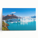 Stretched canvas wall art depicting a stunning glacier landscape with vibrant blues and whites, perfect for adding a serene touch to modern home decor.