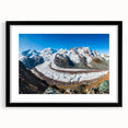 Framed wall art featuring a stunning glacier landscape design, showcased in a sleek black frame with a white mat, perfect for modern home decor. Ideal for nature lovers and interior design enthusiasts looking to enhance their living space with serene and captivating imagery.