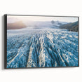 Framed canvas wall art showcasing a stunning glacier landscape design, featuring vivid blues and whites, with a sleek black frame, ideal for modern decor.