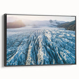 Framed canvas wall art showcasing a stunning glacier landscape design, featuring vivid blues and whites, with a sleek black frame, ideal for modern decor.