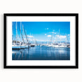 Framed landscape wall art design showcasing a serene harbor scene in muted colors, with a sleek black frame and white mat, ideal for modern home decor.