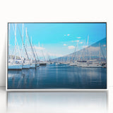 Framed acrylic wall art showcasing a tranquil harbor landscape with soothing blue tones and intricate detailing, perfect for enhancing modern home decor.