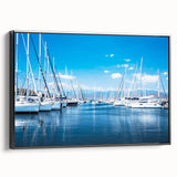 Framed canvas wall art showcasing a serene harbor landscape design, featuring calming blue and green hues, with a sleek black frame, perfect for modern decor.