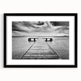 Framed wall art featuring a serene harbor landscape design with a black matte frame, perfect for enhancing home decor and creating a tranquil atmosphere.