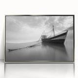 Framed wall art featuring a serene harbor landscape design with silver accents, ideal for home decor, showcasing tranquil waters and vibrant colors.