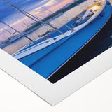 Rolled canvas artwork showcasing a vibrant harbor landscape design, featuring rich blues and greens, ideal for home decor or art collection. Packaged securely in a cardboard tube for safe delivery.