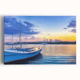 Stretched canvas artwork showcasing a serene harbor landscape with boats and vibrant sunset colors, designed for home decor or office ambiance. Ideal for art enthusiasts.