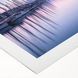 Rolled canvas artwork showcasing a serene harbor landscape design with vibrant colors, ideal for home decor. Perfectly packaged in a protective tube for delivery.