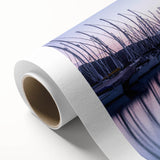 Stylish rolled canvas showcasing a serene harbor landscape design with vibrant colors, ideal for home decor, packaged securely in a protective cardboard tube.