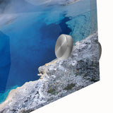 Close-up of a vibrant acrylic and glass wall art piece showcasing a serene hot spring landscape design, featuring rich colors and intricate details, perfect for home decor.