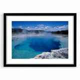 Framed wall art featuring a serene hot spring landscape design, showcasing vibrant colors and intricate details, with a sleek black frame and matting for an elegant presentation. Perfect for enhancing home decor with a touch of nature-inspired beauty.