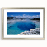 Framed wall art featuring a serene hot spring landscape design, showcased in a stylish silver frame with a mat. Ideal for enhancing home decor and relaxation spaces.