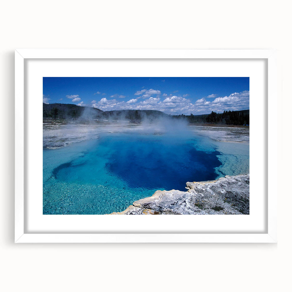 Framed landscape wall art design showcasing a serene hot spring scene with vibrant colors and natural elements, presented in a sleek white mat for an elegant finish.