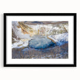 Framed wall art print showcasing a serene hot spring landscape design, presented in a sleek black frame with a white mat, ideal for modern home decor.