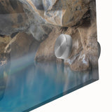Close-up of a vibrant acrylic glass wall art piece featuring a serene hot spring landscape, showcasing rich colors and intricate details, perfect for home decor.