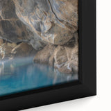 Close-up of a framed canvas artwork depicting a vibrant hot spring landscape, showcasing vivid colors and intricate details, perfect for home decor.