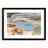 Framed black wall art featuring a serene hot spring landscape design, showcasing vibrant colors and intricate details, perfect for home decor.