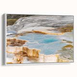 Framed canvas wall art showcasing a serene hot spring landscape design, featuring vibrant colors and intricate details, displayed against a white wall for a modern aesthetic.