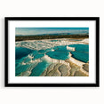 Framed wall art featuring a serene hot spring landscape design, showcasing vibrant colors and intricate details, set in a sleek black frame with a white mat. Perfect for home decor.