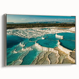 Framed canvas wall art showcasing a serene hot spring landscape design, featuring calming colors of blue and green, elegantly presented with a silver frame.