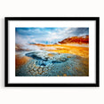 Framed wall art of a serene hot spring landscape with a mat in black, showcasing vibrant colors and natural scenery, perfect for home decor.