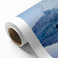 Stunning rolled canvas featuring a vibrant iceberg landscape design, showcasing icy blues and whites, perfect for modern home decor. Packaged securely in a cardboard tube for safe delivery.
