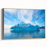 Framed canvas wall art featuring a stunning iceberg landscape design in vibrant blue and white tones, set against a sleek gold frame, ideal for modern decor.