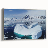 Framed canvas wall art showcasing a stunning iceberg landscape design with silver accents, perfect for modern home decor. The image highlights the unique textures and colors of the icebergs, creating a serene visual impact.
