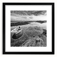 Framed wall art featuring a serene lakeside landscape in muted colors, complete with a black frame and mat for elegant display, ideal for home decor.