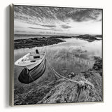 Framed canvas wall art showcasing a serene lakeside landscape in soft blue and green hues, elegantly bordered in silver, perfect for modern home decor.