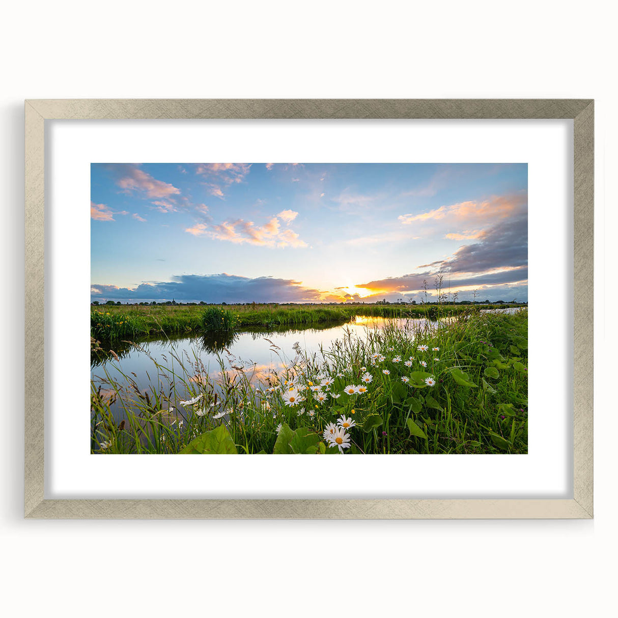 Framed wall art featuring a serene lakeside landscape design with a silver mat, perfect for home decor. The artwork showcases vibrant colors and intricate details, enhancing any living space. This high-quality print combines nature's beauty with a modern aesthetic, ideal for art enthusiasts.
