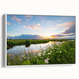 Framed canvas wall art featuring a serene landscape of a tranquil lake surrounded by lush greenery and mountains, presented in a white frame from the Lakes Design collection.