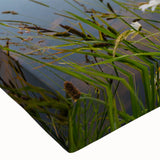 Stretched canvas artwork showcasing a serene lake landscape with vibrant colors and intricate details, perfect for home decor. Ideal for nature lovers.