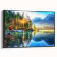 Framed wall art featuring a serene landscape of a tranquil lake surrounded by lush greenery, with a sleek black frame enhancing its elegance. Ideal for home decor.