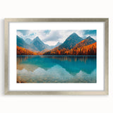 Framed wall art featuring a serene lake landscape with vibrant colors, silver matting, and decorative frame, ideal for enhancing home decor.