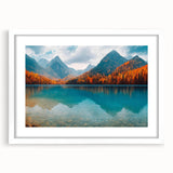 Elegant framed wall art collection showcasing serene landscapes and tranquil lakes, featuring a white mat and sleek frame, perfect for enhancing home decor.