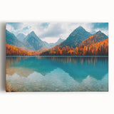 Stretched canvas wall art featuring a serene lake landscape design, showcasing vibrant blues and greens, perfect for enhancing interior decor with a nature-inspired theme.