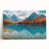 Stretched canvas wall art showcasing a serene lake landscape with vibrant blue waters and lush green trees, perfect for home decor or office settings. The artwork adds a calming touch and enhances any space with its natural beauty.